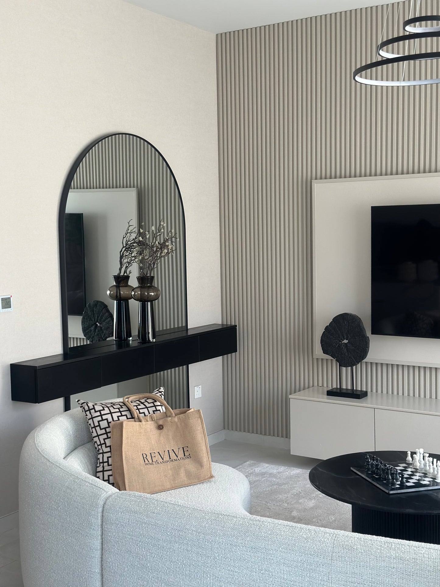 Modern arched mirror with black floating console set